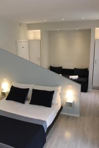 Posteľ alebo postele v izbe v ubytovaní Little Rose Lodge