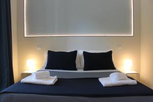 Posteľ alebo postele v izbe v ubytovaní Little Rose Lodge