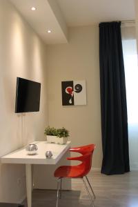 Televízia a/alebo spoločenská miestnosť v ubytovaní Little Rose Lodge + 37 fotografií