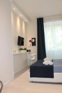 Posteľ alebo postele v izbe v ubytovaní Little Rose Lodge