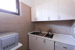 Кухня или мини-кухня в Brera - Fiori Chiari Charme Apartment
