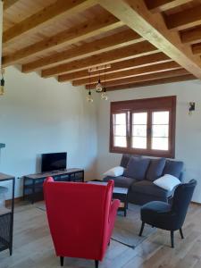 Posezení v ubytování Apartamentos y Casa La Paredana, agroturismo