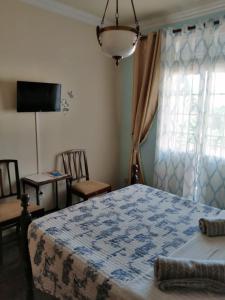 Postel nebo postele na pokoji v ubytování A Casa Do Caseiro