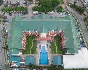 an overhead view of a building with a pool at Hawthorn Suites by Wyndham Abuja in Abuja