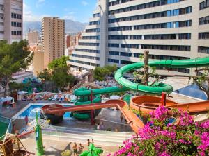 a water park in a city with a water slide at Magic Aqua Rock Gardens in Benidorm