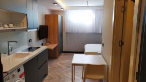 Kuchyň nebo kuchyňský kout v ubytování Meyde Boutique Suites