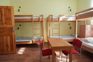 Llit o llits en una habitació de Hostel4u
