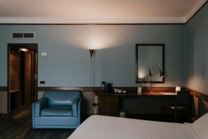 Postel nebo postele na pokoji v ubytování Hotel Del Campo