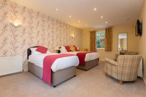 Postel nebo postele na pokoji v ubytování Burn How Garden Hotel - Bowness on Windermere + 37 fotografií