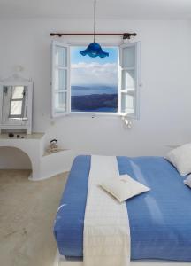 A bed or beds in a room at Altana Heritage Suites