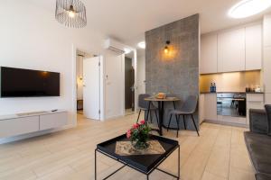 Kuchyňa alebo kuchynka v ubytovaní VIP Apartamenty Butikowa