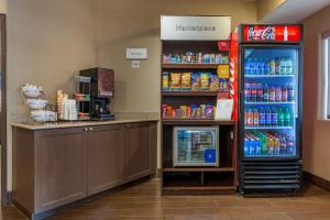 a store with a refrigerator and a drink cooler at Comfort Suites Highlands Ranch Denver Tech Center Area in Highlands Ranch