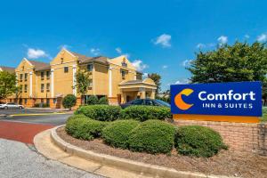 a sign for a comfort inn and suites at Comfort Inn & Suites Atlanta-Smyrna in Atlanta