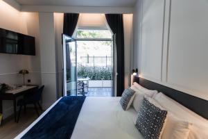 Posteľ alebo postele v izbe v ubytovaní Villa Eugenia Boutique Hotel