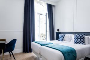 Posteľ alebo postele v izbe v ubytovaní Villa Eugenia Boutique Hotel