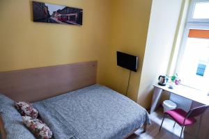 Llit o llits en una habitació de Hostel4u