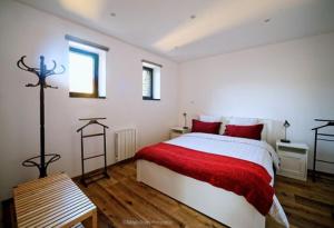 Postel nebo postele na pokoji v ubytování gîte Les Marronniers