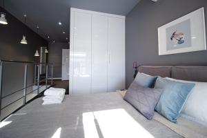 Posedenie v ubytovaní Qbik Loft Modern Apartment