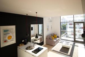 Posedenie v ubytovaní Qbik Loft Modern Apartment