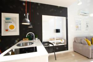 Posedenie v ubytovaní Qbik Loft Modern Apartment
