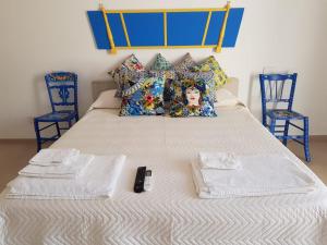 Posteľ alebo postele v izbe v ubytovaní Casa Vacanze Brezza di Gaffe
