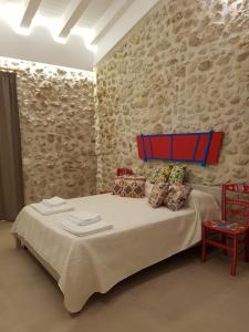 Posteľ alebo postele v izbe v ubytovaní Casa Vacanze Brezza di Gaffe