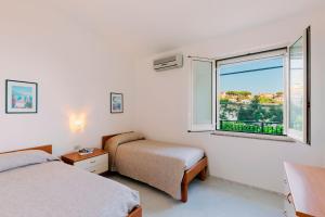 Tempat tidur dalam kamar di Villa San Lorenzo