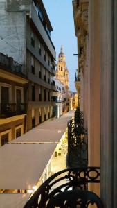 a city street with a building in the distance at The Cathedral Hostel in Murcia