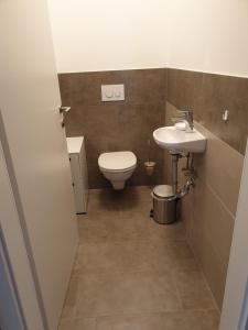 A bathroom at CityApartment MONIKA Még 9 kép