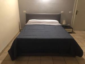 A bed or beds in a room at IL Borgo