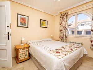 A bed or beds in a room at Apartment San Esteban-1 by Interhome