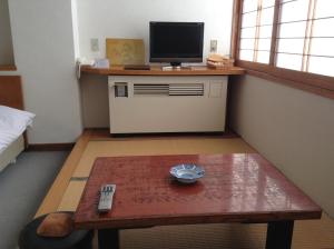 Kuchyň nebo kuchyňský kout v ubytování Resort Inn Chitose
