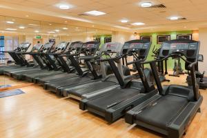a row of tread machines in a gym at Crowne Plaza Leeds, an IHG Hotel in Leeds