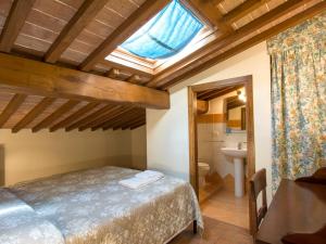 Posteľ alebo postele v izbe v ubytovaní Holiday Home La Gora by Interhome