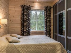 Postel nebo postele na pokoji v ubytování Holiday Home Päivänsäde 8 lapinkulta by Interhome
