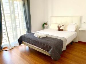 Ένα ή περισσότερα κρεβάτια σε δωμάτιο στο 9 Moderna Villa Independiente -Jacuzzi- Gran Alacant