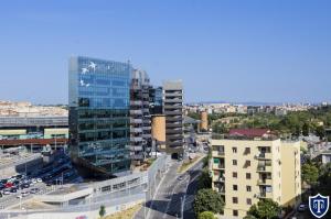 an aerial view of a city with tall buildings at TIBURTINA INN GUEST HOUSE in Rome