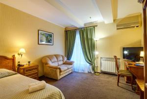 TV a/nebo společenská místnost v ubytování Art Hotel Academy