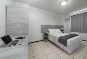 Posteľ alebo postele v izbe v ubytovaní Lumar Hotel