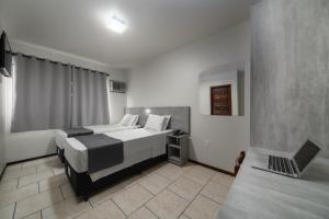 Posteľ alebo postele v izbe v ubytovaní Lumar Hotel