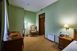Postel nebo postele na pokoji v ubytování Art Hotel Academy