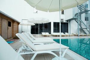 Bazén v ubytování Belsun Hotel nebo v jeho okolí