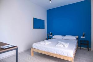 Postel nebo postele na pokoji v ubytování Belsun Hotel
