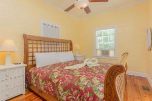 Ein Bett oder Betten in einem Zimmer der Unterkunft Key West Villas