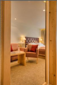 Postel nebo postele na pokoji v ubytování Hotel Palin