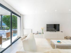 TV a/nebo společenská místnost v ubytování Holiday Home Marianne by Interhome