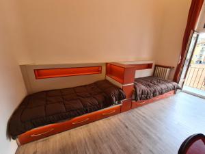 Postel nebo postele na pokoji v ubytování Apartaments Vicus 3 con vistas a la Plaza Mayor de Vic
