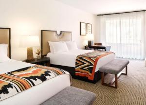 Ένα ή περισσότερα κρεβάτια σε δωμάτιο στο Enchantment Resort