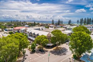 an overhead view of a town with a street at Byron Bay Hotel and Apartments in Byron Bay