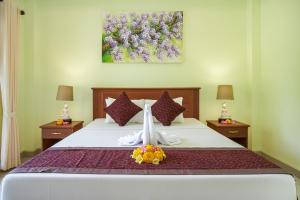 מיטה או מיטות בחדר ב-Hidden Padma Retreat